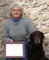 Poppy with her  Mom and CGC certificate